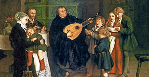 Musizierend im Kreis seiner eigenen Familie: Martin Luther. Foto: Gemälde von Gustav Spangenberg, um 1875.